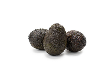 Dark avocados on isolated on white background.