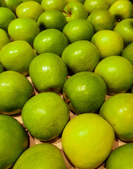 green apples on the market in selective focus