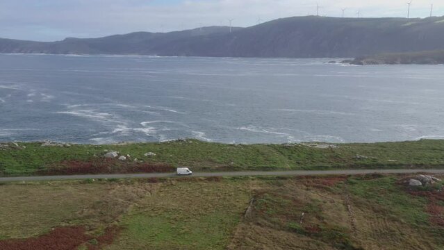 Drone aerial view of a camper van in Galicia, Spain