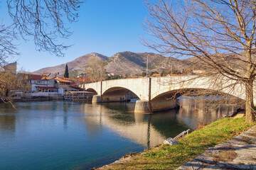 View of Trebisnjica river near Old Town of Trebinje on sunny winter day. Kameni most ( Stone bridge  ) over river Trebisnjica. Bosnia and Herzegovina, Republika Srpska