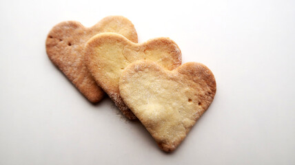 Three ruddy warm cookies on a white background for valentine's day
