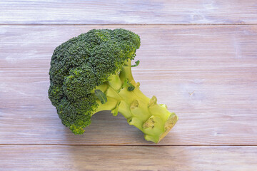 Green vegetables. Fresh broccoli on rustic table. Copy space