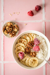 rice porridge with banana and raspberries