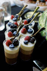 Jelly dessert in a plastic cup with a spoon