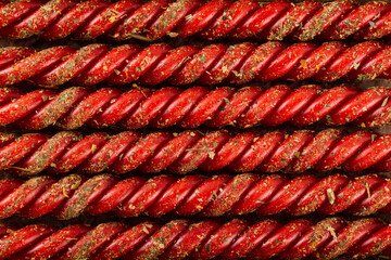 Texture of red holiday candles. Festive background.