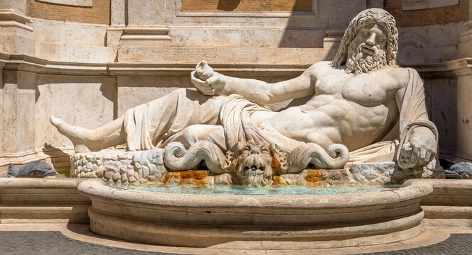 Famous Greek sculpture of Ocean god, named Marforio, located in Rome, Italy. Classic mythology in art.