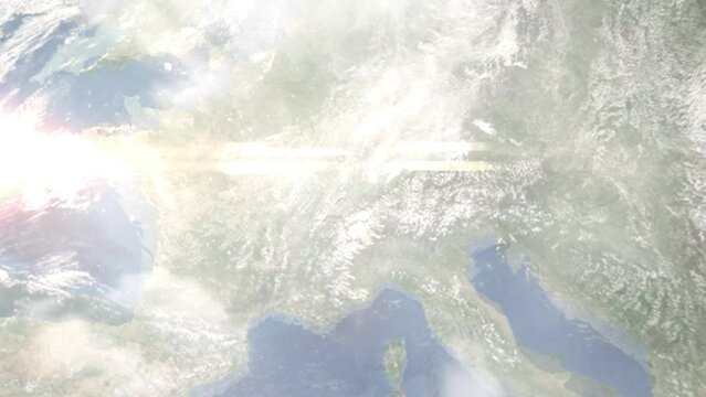 Earth zoom in from outer space to city. Zooming on Switzerland, Bern. The animation continues by zoom out through clouds and atmosphere into space. View of the Earth at night. Images from NASA