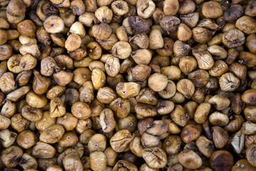 Top view of the shelf with dried figs in the bazaar. High quality photo