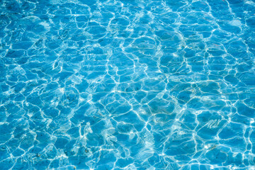 Fototapeta na wymiar Blue ripped water in swimming the pool