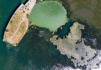 Coast as a background from top view. Turquoise water background from top view. Summer seascape from air.