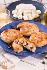 Pastry swirls with cheese and olive filling.
