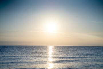 Fototapeta na wymiar sunset and sunrise over the sea
