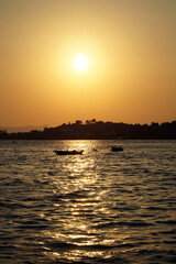 Sunset over the Aegean Sea. View from the embankment of the city of Fethiye.