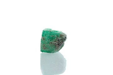 macro mineral stone emerald on a white background