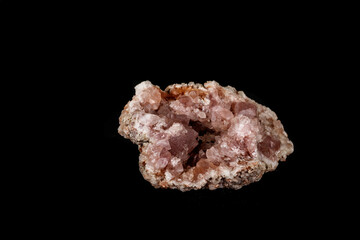 Macro mineral stone Pink Amethyst on a black background