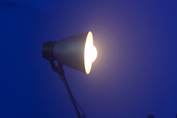 Lamp on blue background