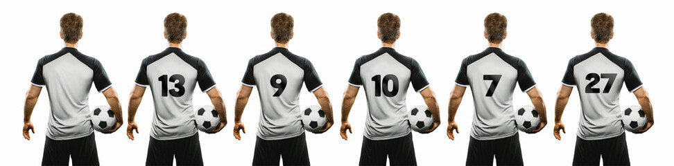 soccer player holding the ball with his back twisted with different popular shirt numbers. Isolated on the white background.