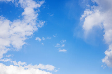 Naklejka na ściany i meble Beautiful blue clouds in the sky. Blue sky background.