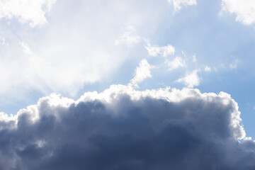 Beautiful blue clouds in the sky. Blue sky background.