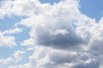 Naklejka na ściany i meble Beautiful blue clouds in the sky. Blue sky background.