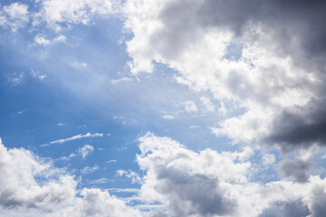 Beautiful blue clouds in the sky. Blue sky background.