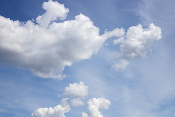 Fototapeta na wymiar Blue sky background. Blue sky with clouds close up.