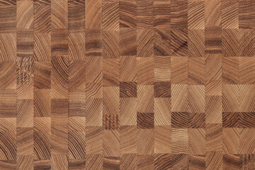 Wooden texture with a beautiful geometric pattern. Background of squares, rectangles and stripes.