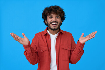 Surprised excited young indian man looking at camera with wow face expression feeling amazed...