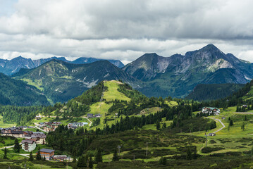 The houses, roads, ski lifts in alpen ski resort Obertauern in summer, Radstadter Tauern, Austria - 485200037