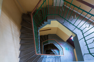 Krakow, Poland, December 17, 2021; A staircase in an old historic tenement house in Krakow.