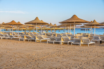 , Hurghada, Egypt. .Swimming pool and accommodation at tropical resort. Buildings, swimming pools and a recreation area by the red sea.