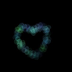 heart-shaped beads on the black background