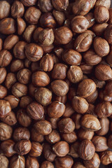 Close up brown hazel nut on wooden desk. Healthy organic vegetarian snack hazelnut. Background