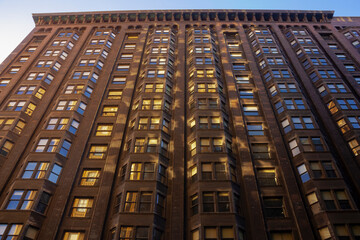 The facade of an old brick building