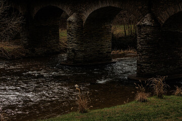 Dark Bridge with River