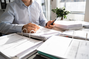 Public Tax Accountant Using Calculator