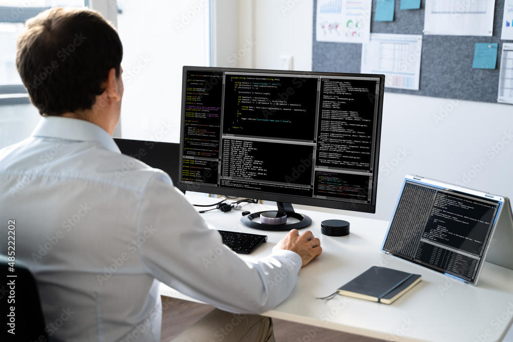 Poster computer programmer writing program code on computer