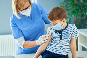 Young kids during vaccination in hospital