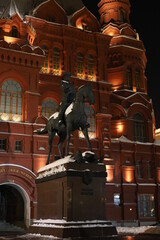Fototapeta premium Monument to Marshal Georgy Zhukov on red square in Moscow, Russia at night