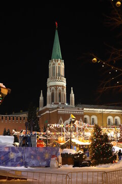 The kremlin in winter at night. Christmas tree toys on the tree