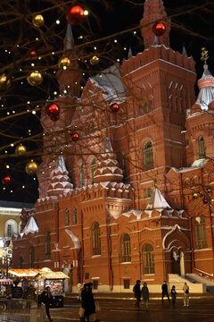 The kremlin in winter at night. Christmas tree toys on the tree