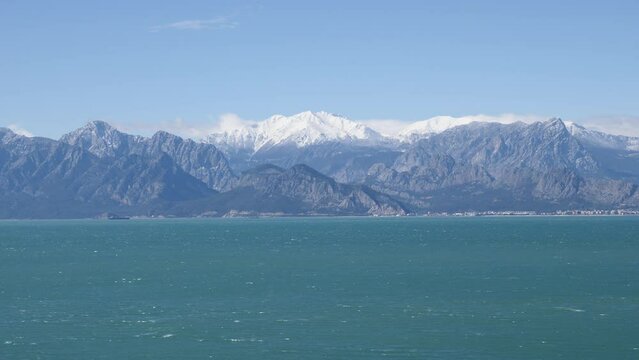 touristic cliff city antalya in mediterranean turkey coastline by the mediterranean sea with mountains