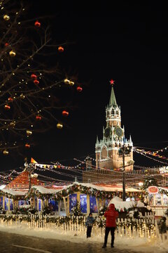 The kremlin in winter at night. Christmas tree toys on the tree
