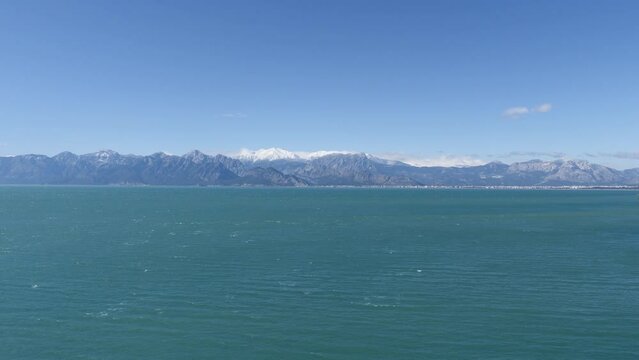 touristic cliff city antalya in mediterranean turkey coastline by the mediterranean sea with mountains	