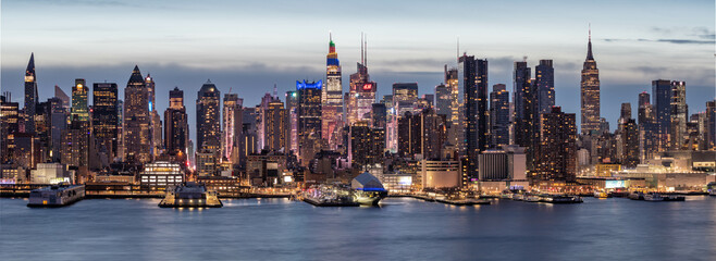 NYC skyline panorama photo, perfect for website design, early morning long exposure technique.