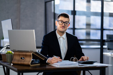 Professional Financial Accountant Manager Using Laptop For Taxes