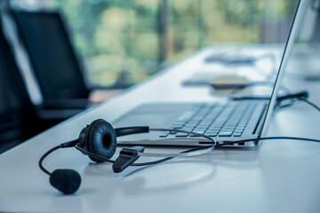 Headset and customer support equipment at call center ready for actively service . Corporate...