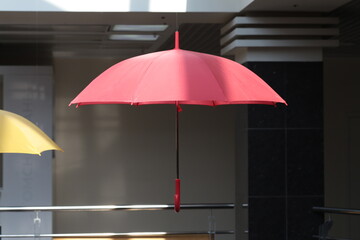levitating colorful umbrellas in the mall