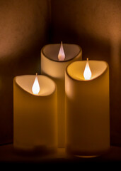 Christmas diwali decoration with fairy lights, candles, books,  Cozy home and holiday concept spa and relax