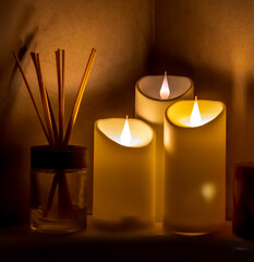 Christmas diwali decoration with fairy lights, candles, books,  Cozy home and holiday concept spa and relax